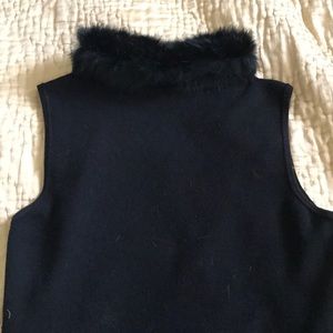 Fitted sleeveless with rabbit trim